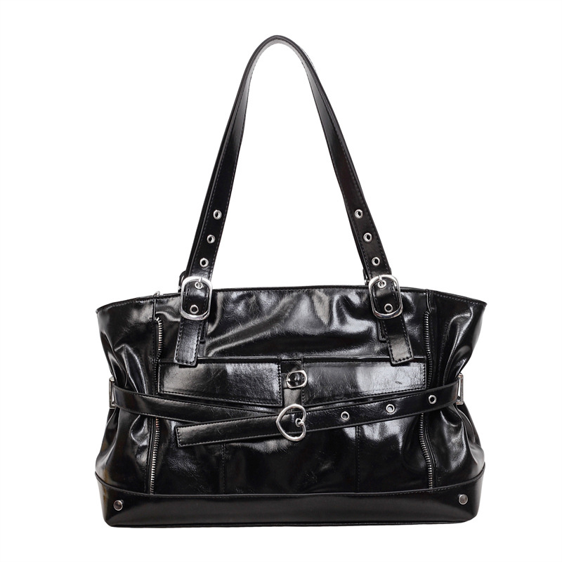 Bolsa de motocicleta de chicas calientes retro para mujeres 2026 verano nuevo nicho de lujo ligero bolso de hombro de brazo bolso de viaje transfronterizo