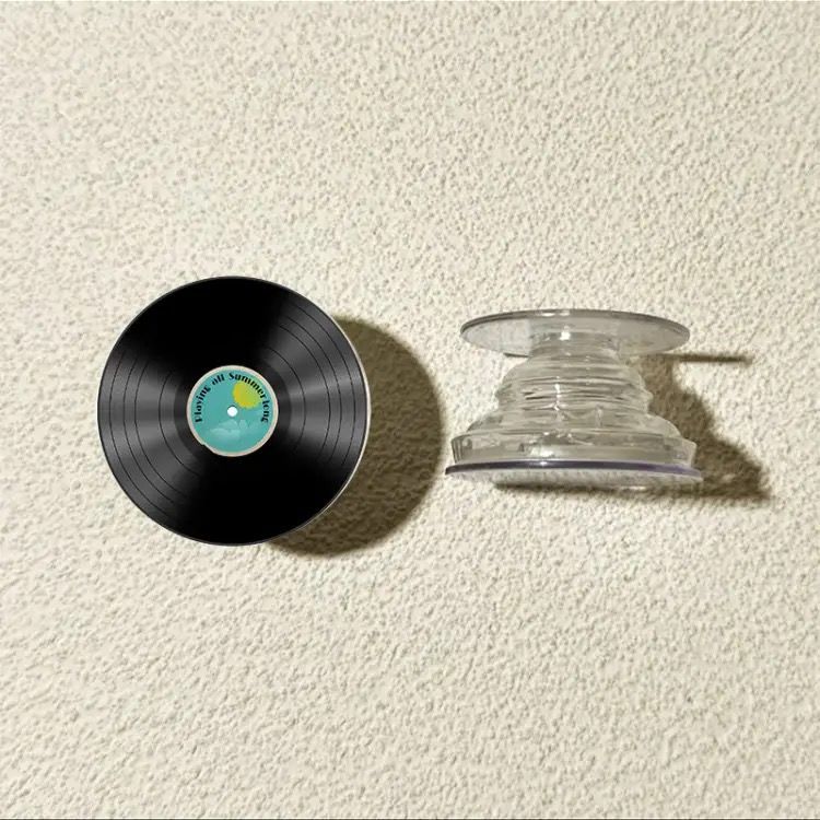 Grabación de CD vinilo redondo airbag soporte adhesivo tipo teléfono móvil adhesivo 360 ° giratorio telescópico succión magnética de corriente de marea