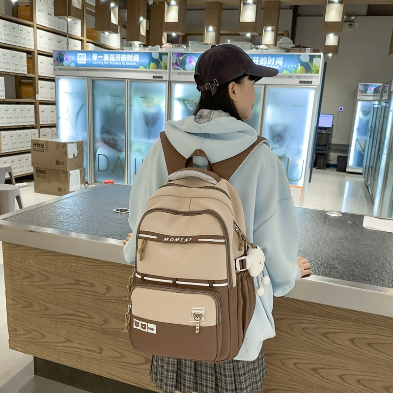 Nuevas mochilas casuales mochilas escolares transfronterizas para estudiantes de secundaria y secundaria mochilas escolares de moda para viajes al aire libre mochilas de estilo escolar