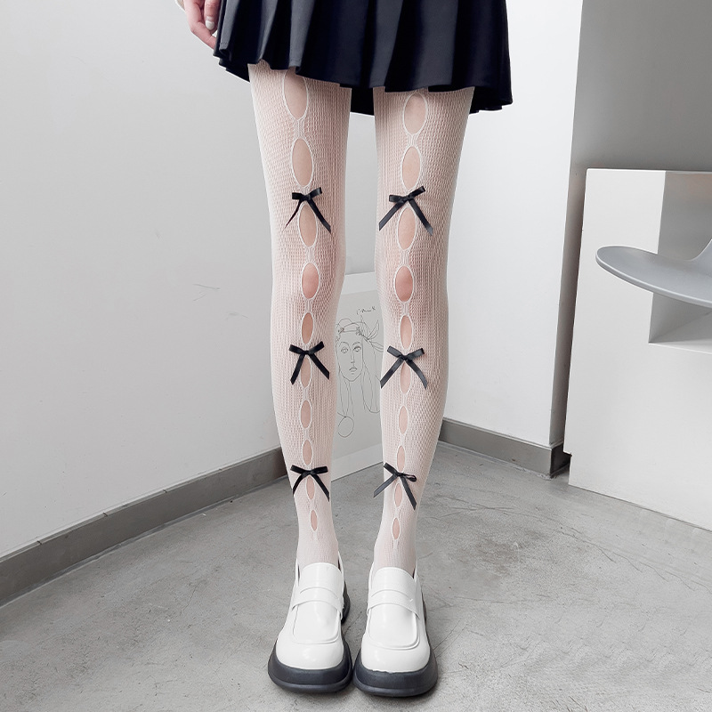 Ripped bowknot primavera y verano Delgado JK Internet celebridad sexy negro malla calcetines ins moda estilo japonés oscuro hueco calcetines de fondo