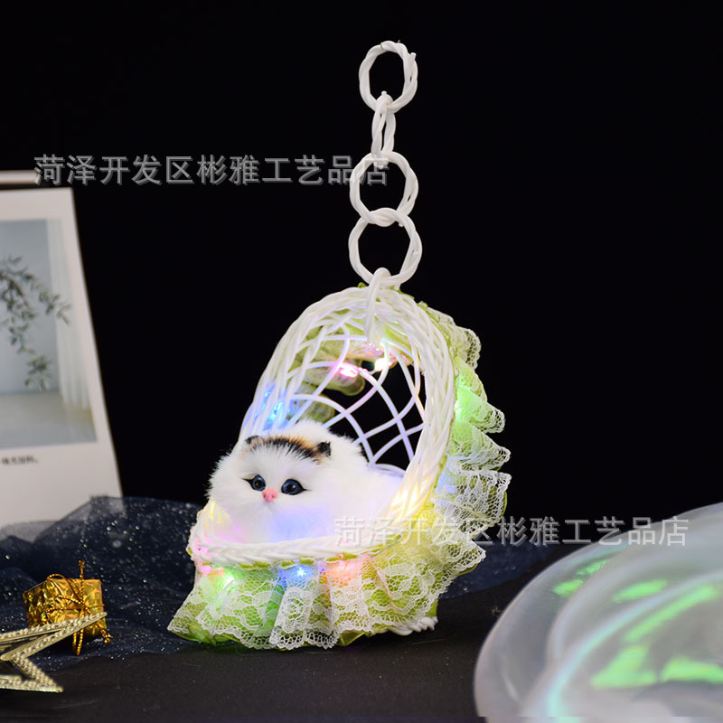 Cestas luminosas con lámparas y llamadas gatitos, simulación de gatos, juguetes luminosos para niños, estandos, puntos de venta.