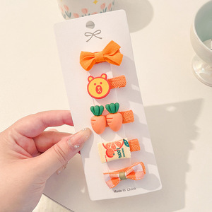 Hermosos clips de cabello de color para niños coreanos de alto nivel sensación de arco de niñas bolsa de tela no daña clips de cabello de bebé