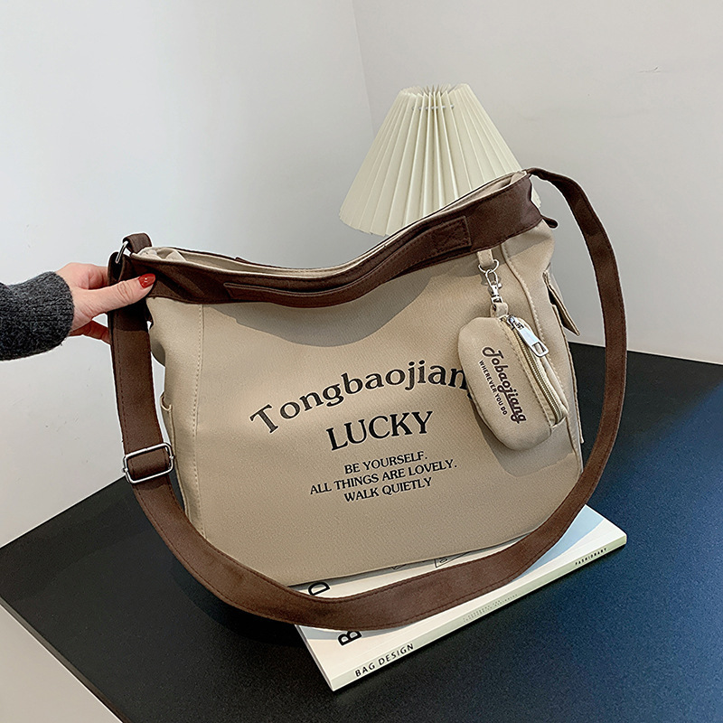 Canvas Bag Japanese Ins Large Capacity Student Shoulder Bag Women's Pendant Canvas Bag Niche Artistic All-match Crossbody Bag