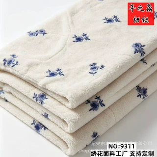 跨境毛绒绣花面料新生儿连体衣宝宝衣服婴儿蝴蝶衣羔羊绒刺绣布料