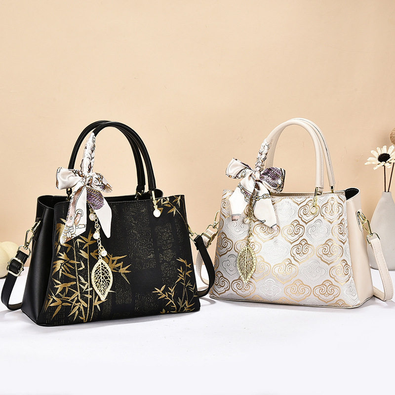Día de la Madre 2026 nuevo estilo nacional de lujo ligero bolso de mano de estilo de mujer gran capacidad de viaje de hombro mochila