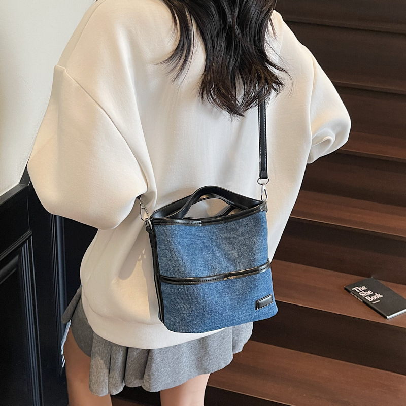 Bolso de mano transfronterizo popular bolso de cubo de agua mujer otoño / invierno 2025 nuevo estilo versátil bolso de hombro retro bolso coreano