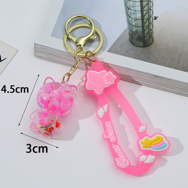 Caricatura KT en botella de arena flotante de aceite en burbujas de aceite llavero llavero de automóvil regalos de vacaciones