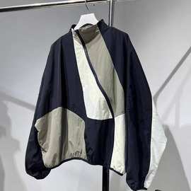 欧货撞色拼接独特别致斜门襟冲锋衣外套女宽松短款立领风衣夹克秋