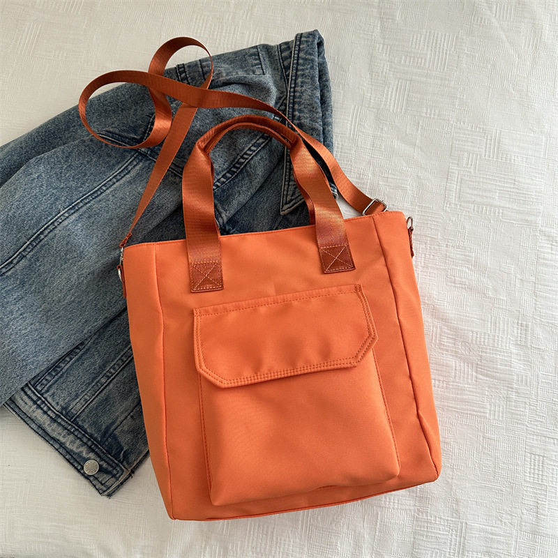 Corea del estilo de transporte universal lona multi-bolsillo TOT estudiantes de arte ocio simple 2025 bolso de hombro portátil