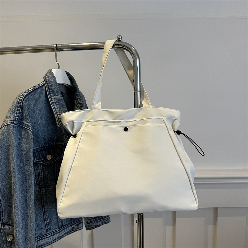 Bolso de lona para mujeres 2024 nuevo este año popular bolsa de gran capacidad de verano universal bolsa de viaje de hombro