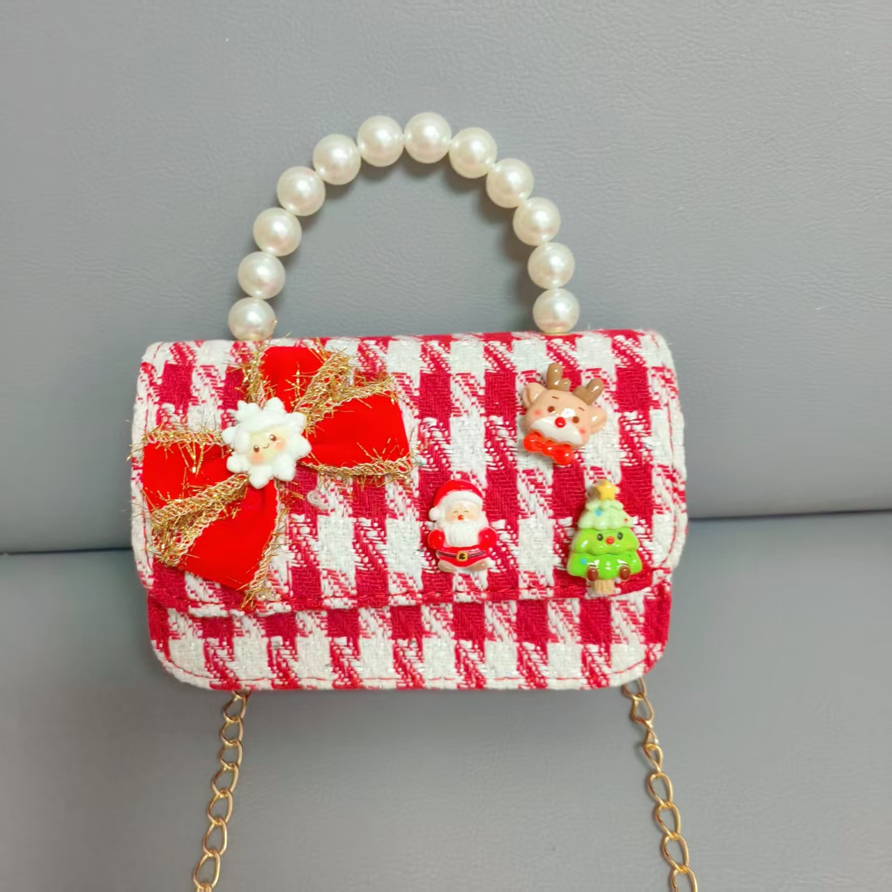 Cartera de Año Nuevo rojo arco de papá Noel bolso de perla pequeña cadena de viento fragante bolso de hombro
