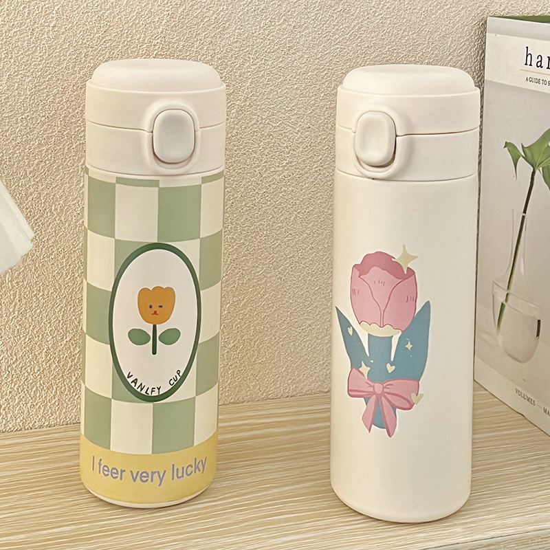 Suministro directo de fábrica taza de vacío en stock al por mayor de dibujos animados lindo flor tulipán con hebilla con paja taza de vacío