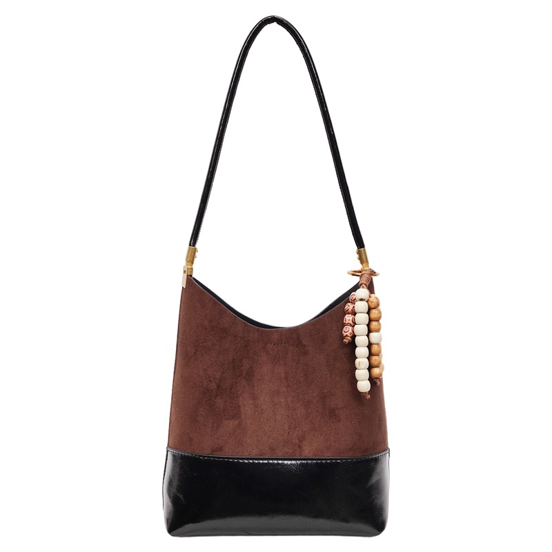 Bolsa de cubo de lujo ligera transfronteriza de gran capacidad para mujeres 2025, otoño y invierno, nueva bolsa de brazo universal, nicho, bolso de hombro de empalme