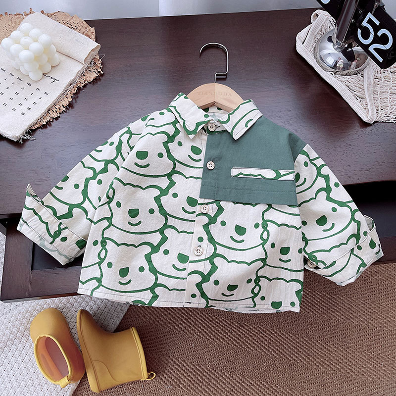 Camisas de impresión de bebés de algodón puro otoño 2025 nuevo cardigán de dibujos animados para niños chaqueta delgada camisa versátil