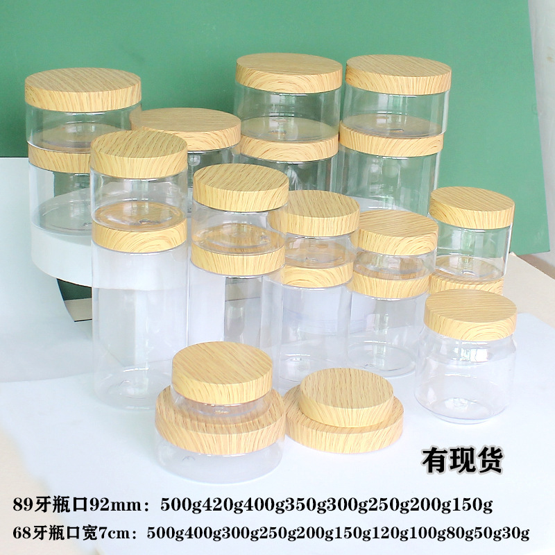 In-Stock Wood-Grain Lid Pet Plastic Wide-Mouth Bottle, Wood-Grain Lid Cream Jar, Facial Mask Jar, Eye Cream Jar In-Stock Wood-Grain Lid Pet Plastic Wide-Mouth Bottle, Wood-Grain Lid Cream Jar, Facial Mask Jar, Eye Cream Jar