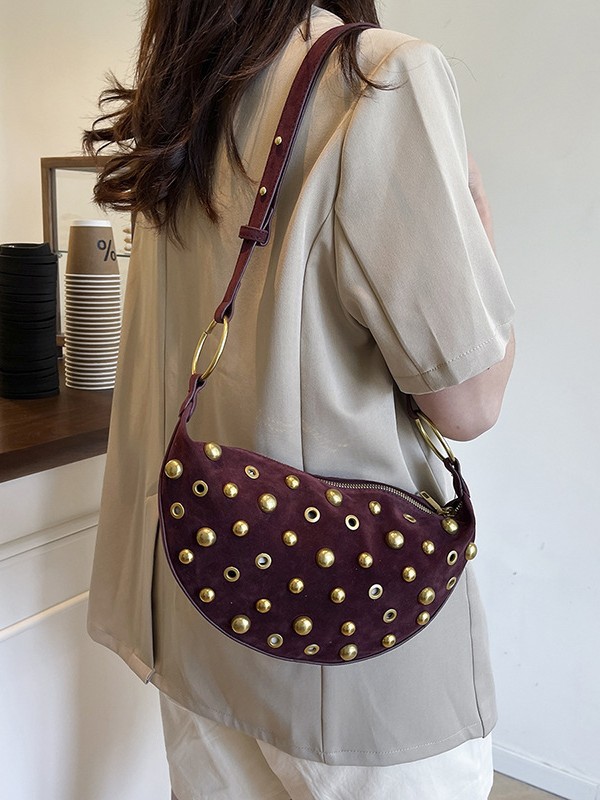 Bolso para mujeres 2025 nueva moda europea y americana estilo punk remache bolso de bolsillo de hombro de alta calidad lujosa bolsa de mochila