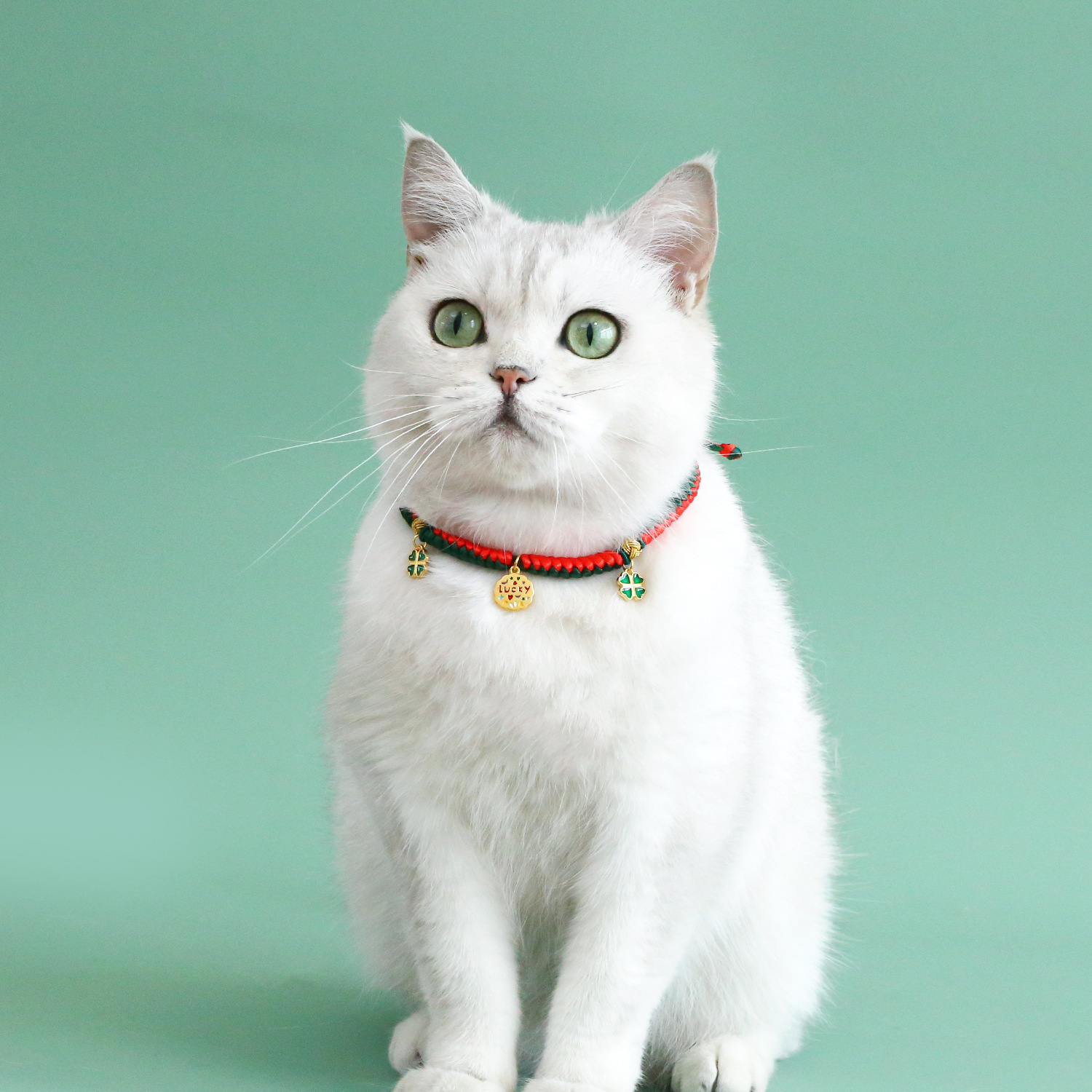 2023 nuevo collar de cuerda roja tejida de dos colores mascota gatos perros campana de Navidad colgante de oro de hierba de la suerte