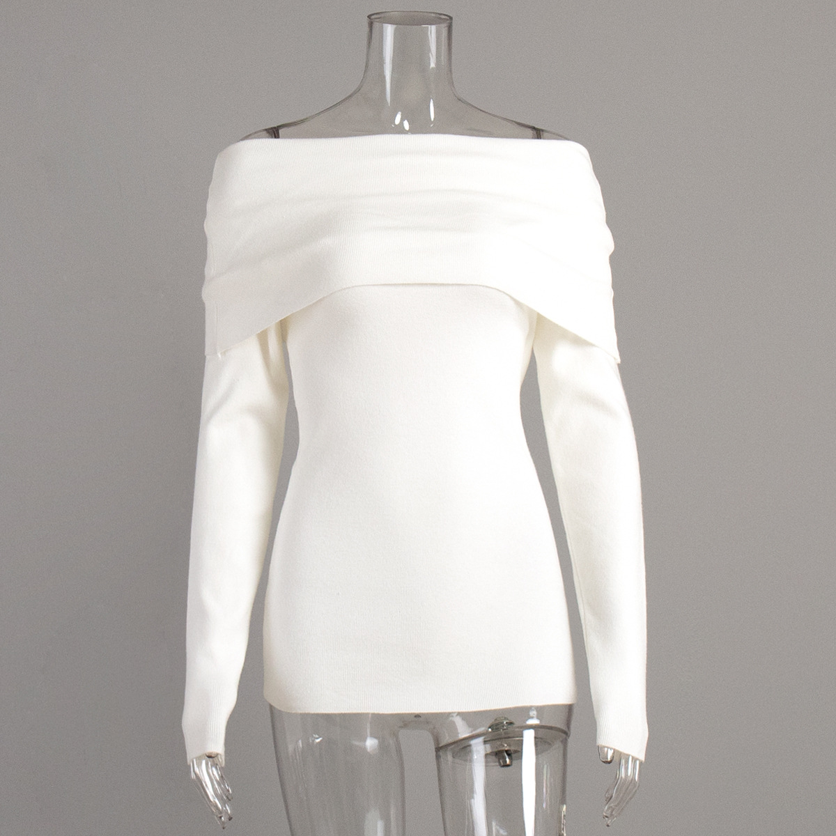 Cross-border 2026 nuevo estilo europeo y americano un hombro temperamento de diseño de hombro abierto sensación delgada envuelta en un suéter de punto de punto para mujeres