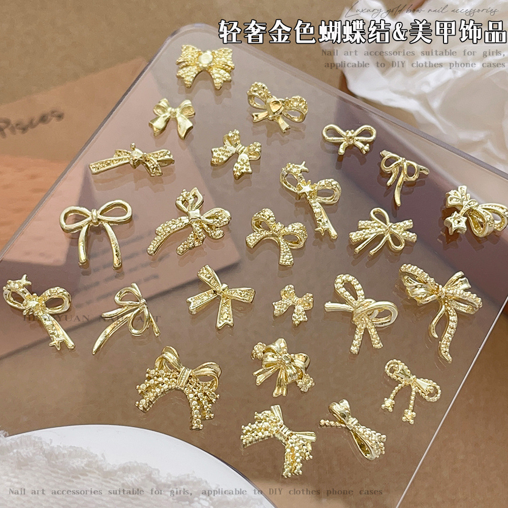 爆款立体镂空金色蝴蝶结美甲装饰轻奢精致法式飘带领结合金指甲钻