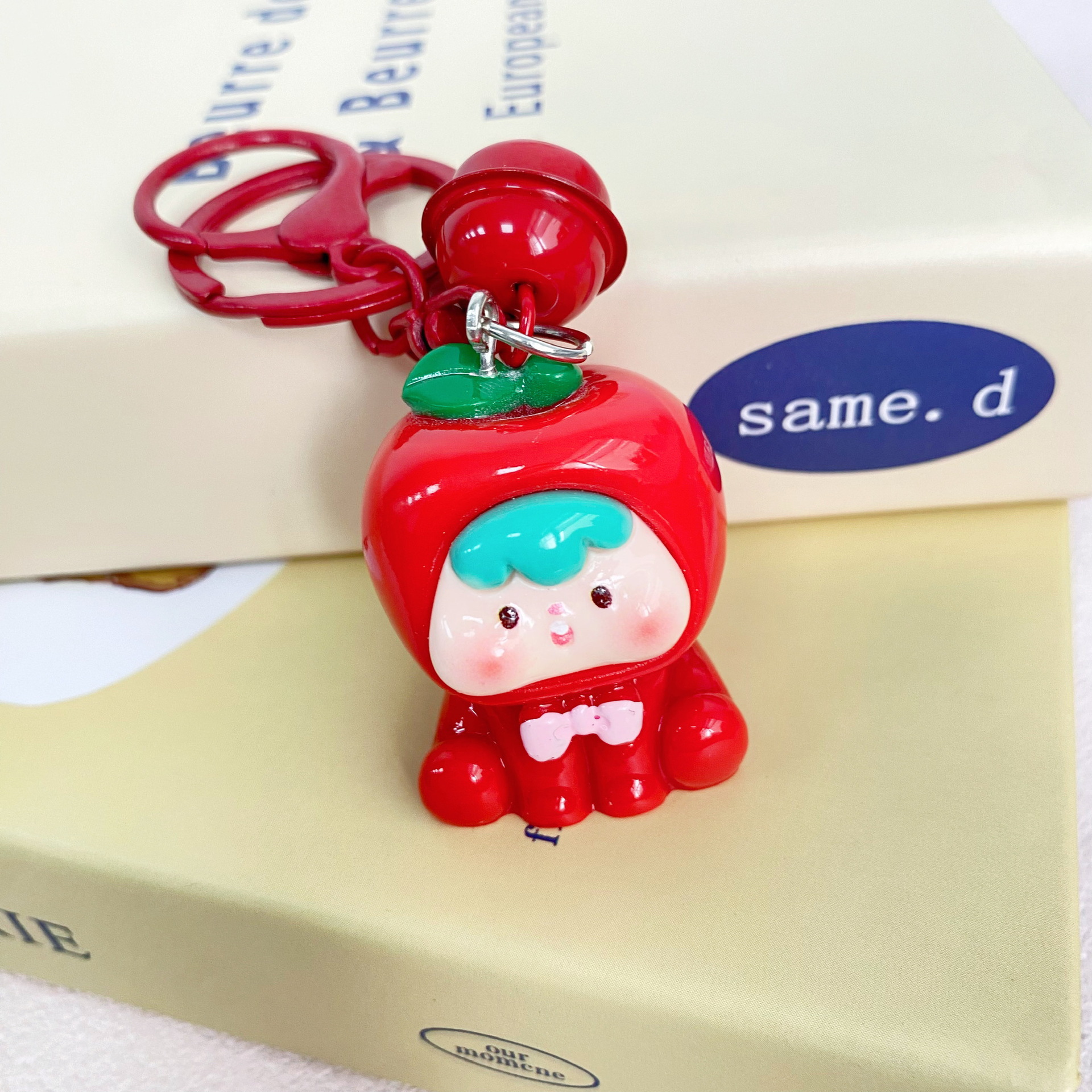 新商品の立体果物の子の鈴の鍵は少女の心の学生を掛けて親友のプレゼントを飾ってカップルを掛けます。