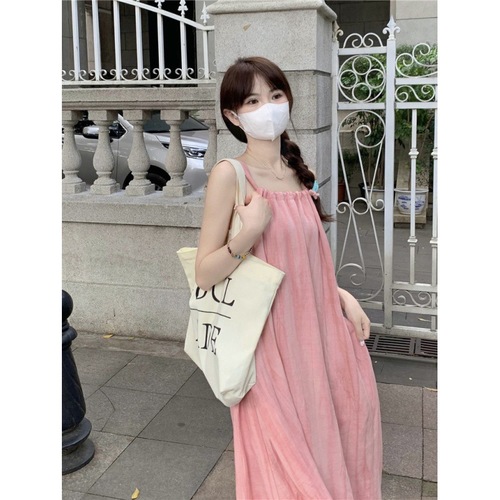 Vacation-style pink spaghetti strap dress for women, 2024 summer, loose and casual, flattering A-line midi dress