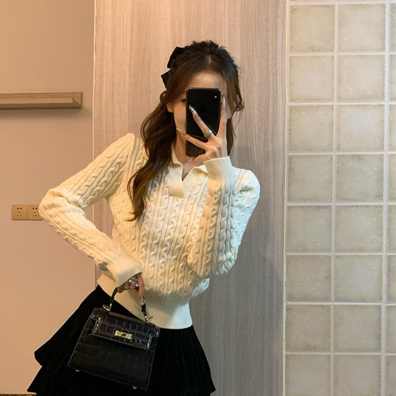 Suéter de cuello polo de otoño de mujeres nuevos productos cortos de mangas largas con cuello en V blanco camisa de punto superior