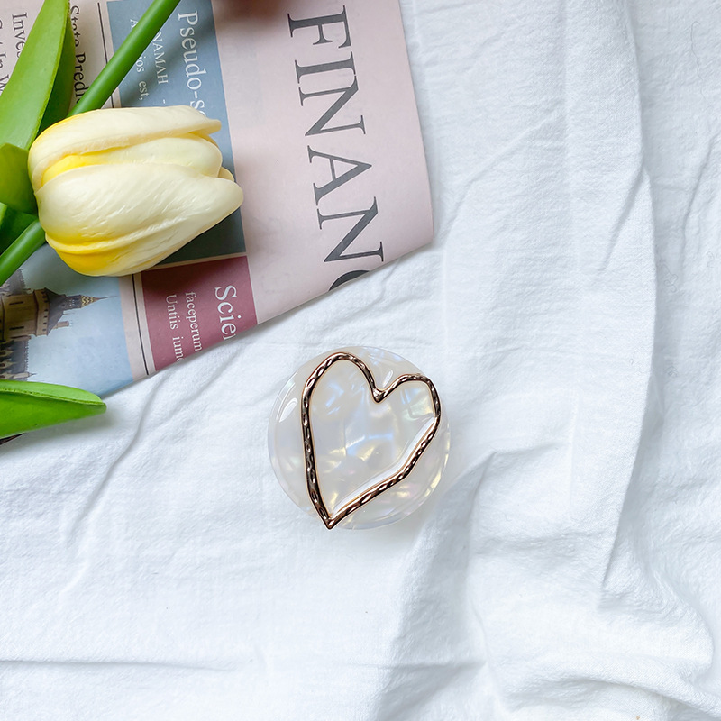 Marble patterned mobile phone airbag bracket, electroplated hollow heart back sticker, adhesive, stretchable and stable_voghion.com