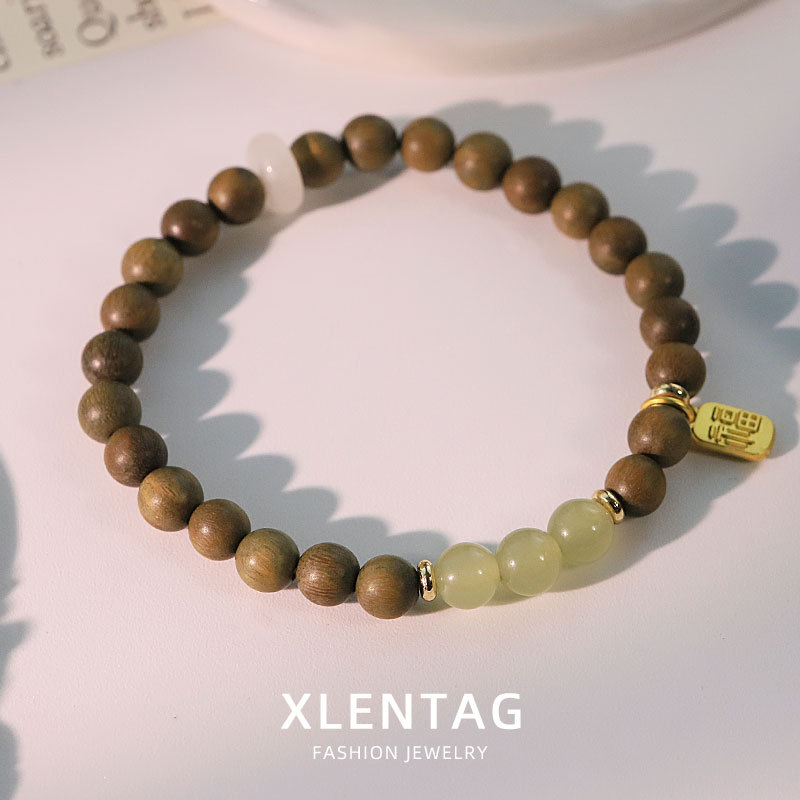 Pulsera de madera de sándalo verde oscura y jade Tian