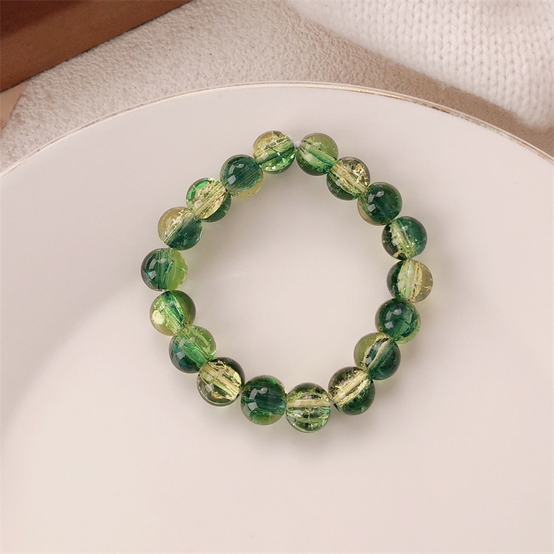 Pulsera de cuentas degradadas de hielo de estilo explosivo Mori alrededor de los dedos