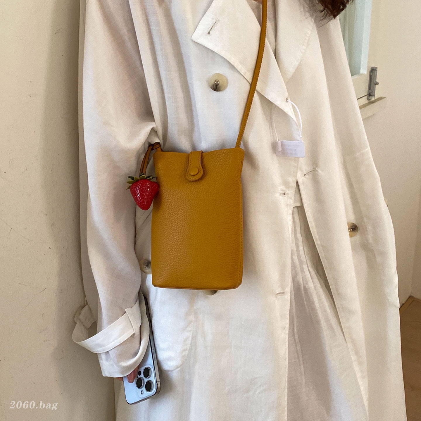 Nuevo mochila ligero verano 2026 teléfono móvil cuero suave versátil cubo de transporte mini mochila de hombro mujer estilo coreano
