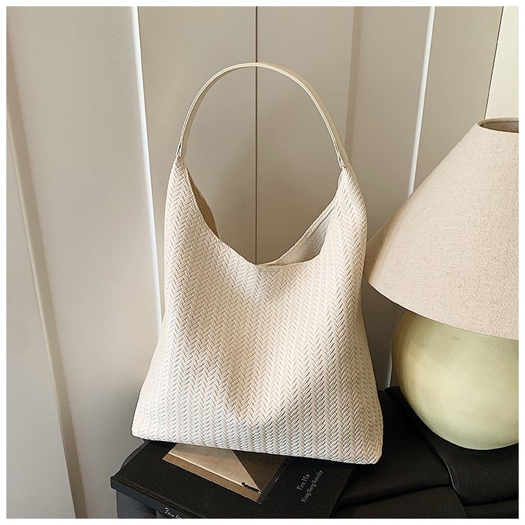 In 2025, a new Korean-style casual woven pattern large-capacity tote bag for women's commuting to work undefined