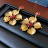 77#Silver needle inlaid diamond retro flower earrings