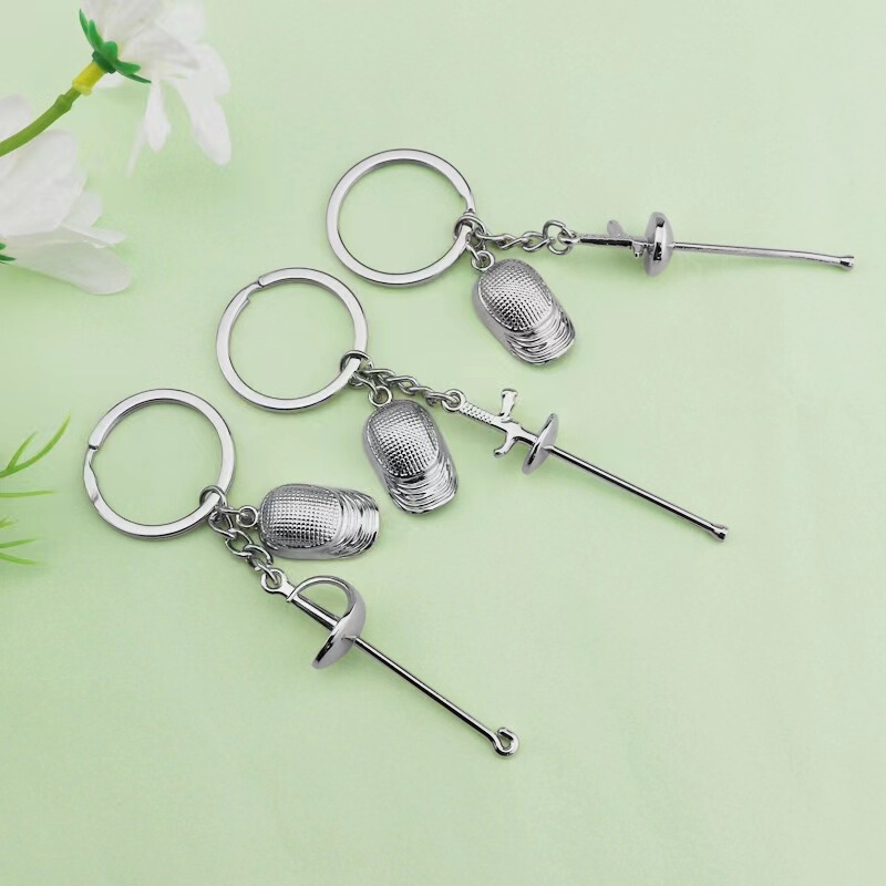 Fencing key chain wholesale fencing three-piece key chain sword strike sports professional small gift engraved LOGO