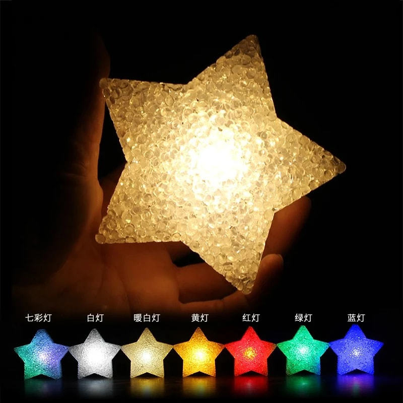 Stage props for children's day performances, including handheld glowing star lights and five-pointed stars, as well as choir and dance performances.