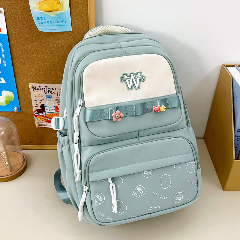 Nueva mochila de hombro simple letras negras con lindos colgantes mochila de carga mochila de gran capacidad