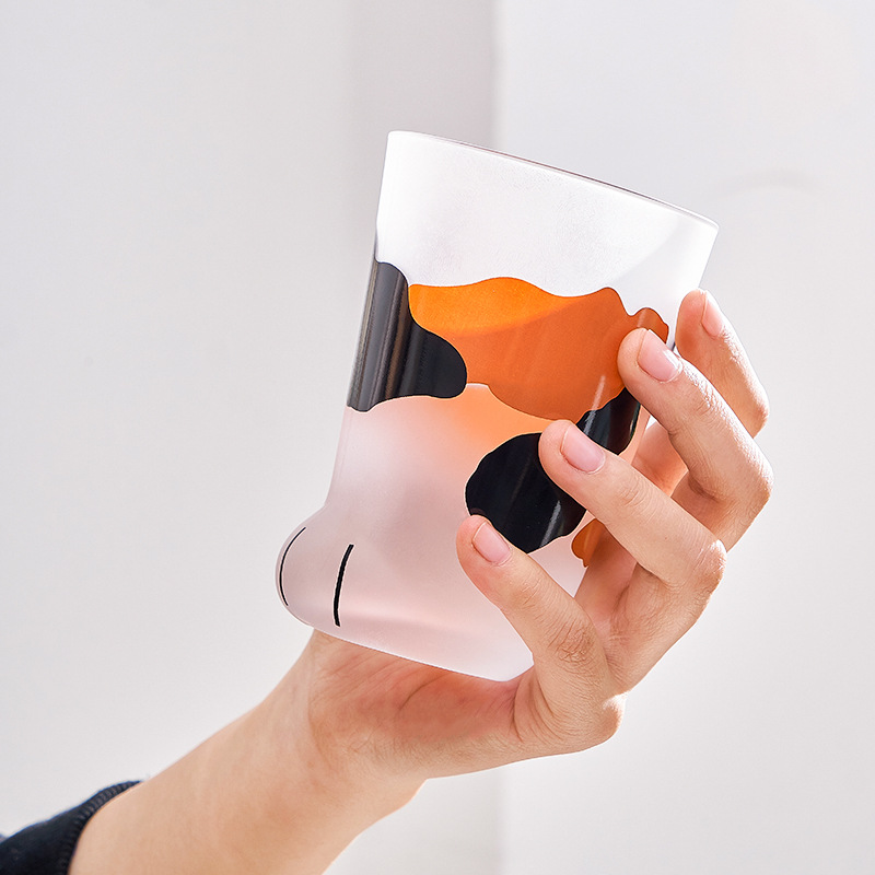 Taza de garra de gato japonés caliente taza de vidrio de dibujos animados esmerilado taza de pie de gato taza de agua resistente al calor taza de leche creativa fábrica al por mayor