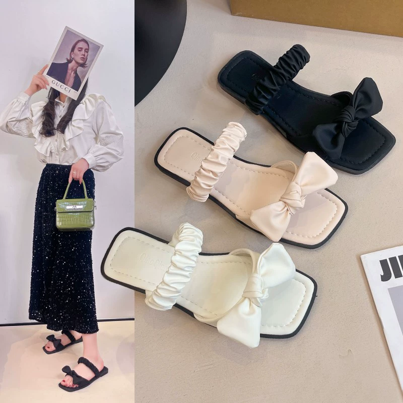 Французские банты буксирные женские туфли носят наружные 2025 новые летние вечерние ветерки плоские туфли