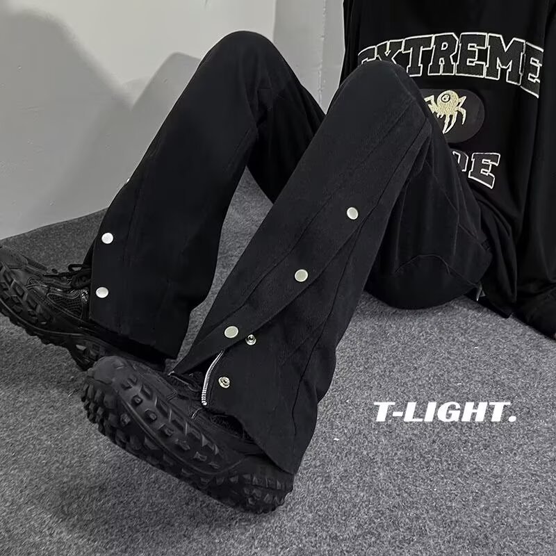 Otoño y invierno nuevo estilo americano botón negro jeans de moda micro bocina casual nicho pantalones hip-hop
