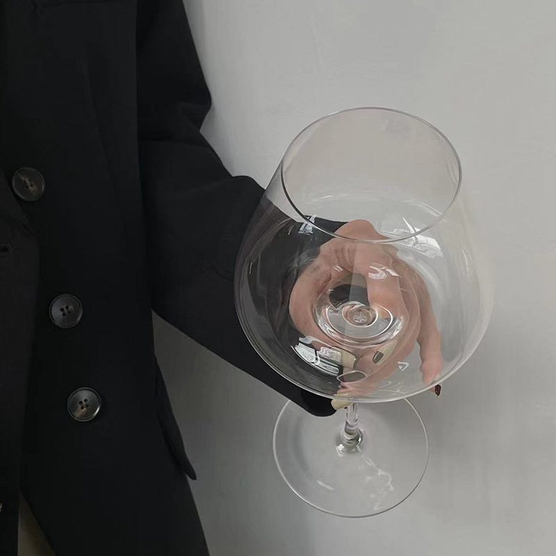 Creativo en el viento borgoña cóncavo fondo ligero lujo vidrio de cristal de alta calidad copa de vino de alto pie copa de vino para el hogar