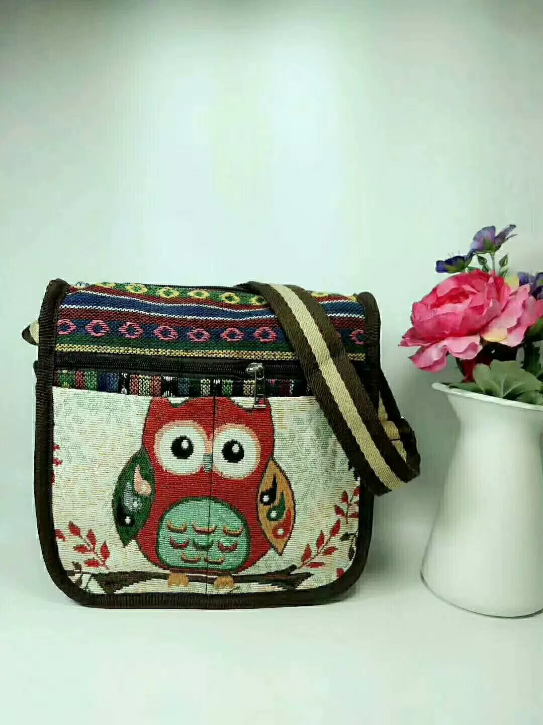 民族风提花三拉多用女斜跨包