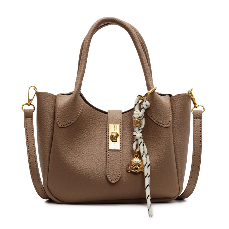 Bolso de cesta de verduras simple de comercio exterior para mujer 2025 nuevo bolso de hombro casual salvaje de moda bolso de cubo de aire extranjero