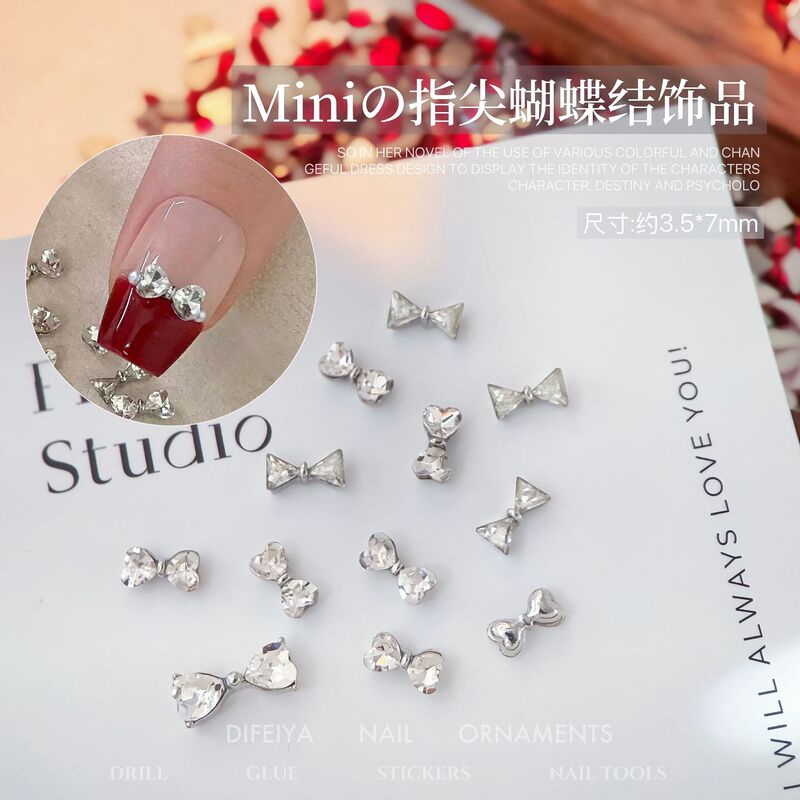 Internet famous new silver bow tie fingertip bow nail drill finished alloy bow pile drill nail decoration