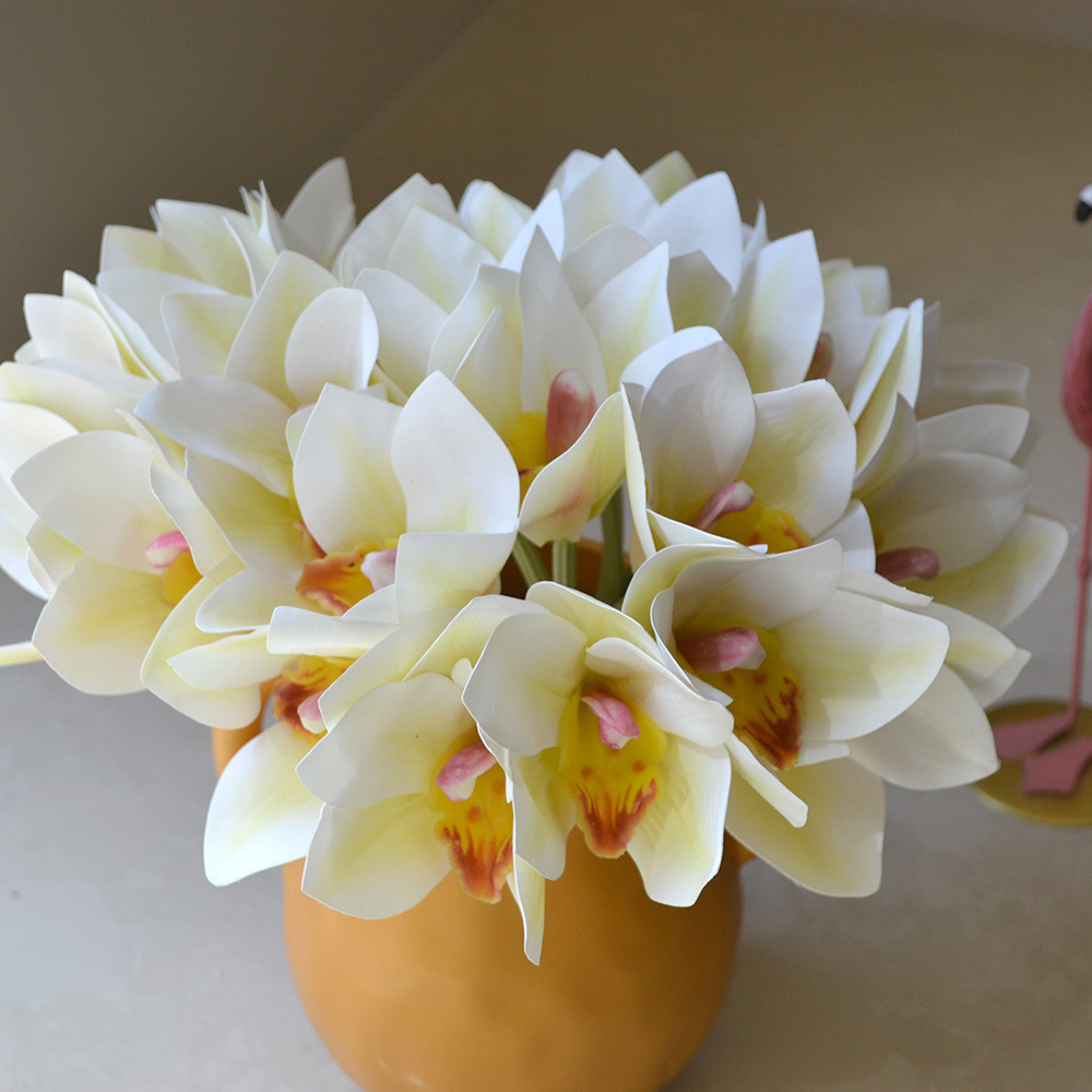 cymbidiums with bunches and flowers in hand, home model room decoration, dining table and coffee table decorations, fake flowers_voghion.com