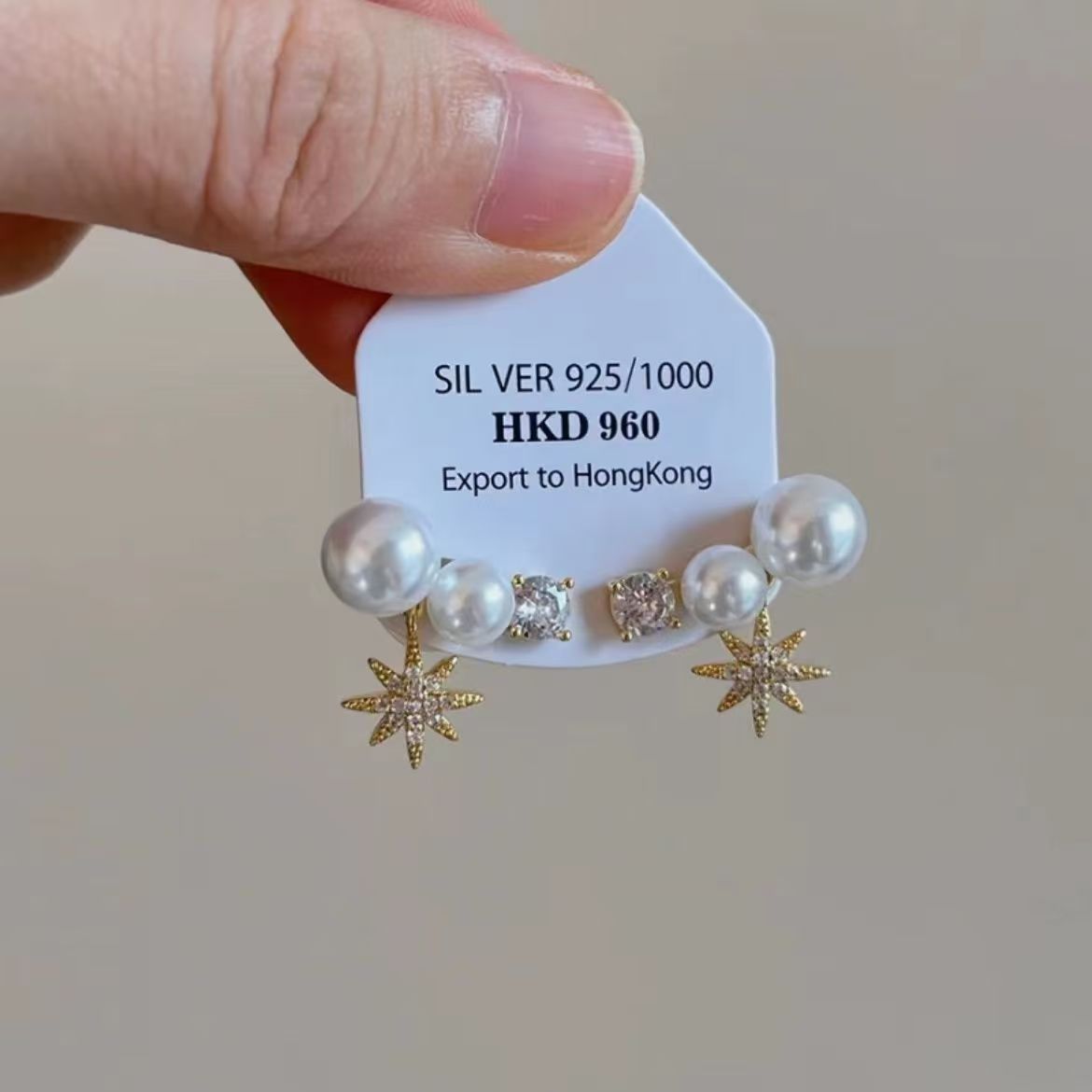 フランス式の清冷感の銀色の金属のイヤリングの真珠のドリルのフリンジデザイン感の耳飾りのファッションの高い顔の値の女性の耳飾り