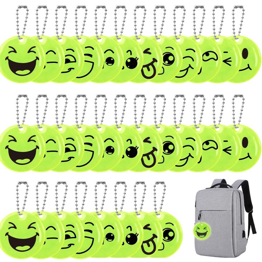 Reflective smiley face pendant backpack chain emoji keychain for students to reflect light when traveling or cycling at night