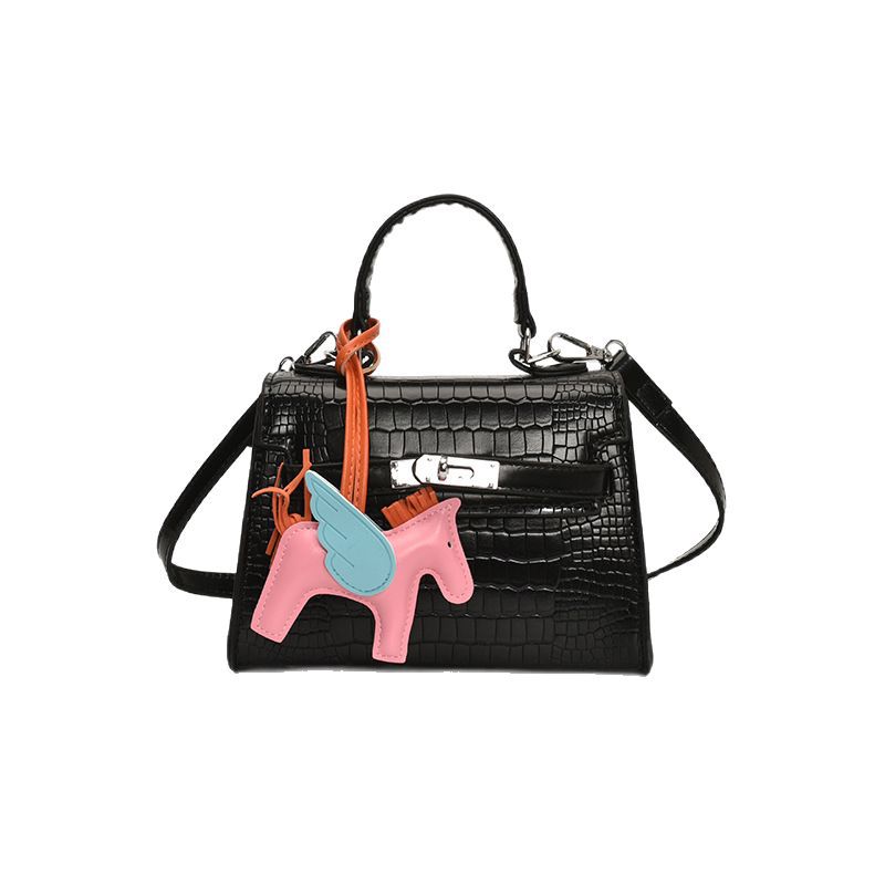 Bolso Kelly de mano de alta gama para mujer 2025 nueva moda casual bolso de hombro con patrón de piedra moda bolso de mensajero de color sólido