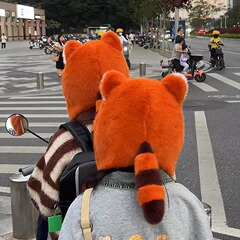 かわいいアライグマの耳保護雷鋒帽の子供は耳をつまんで可動します。