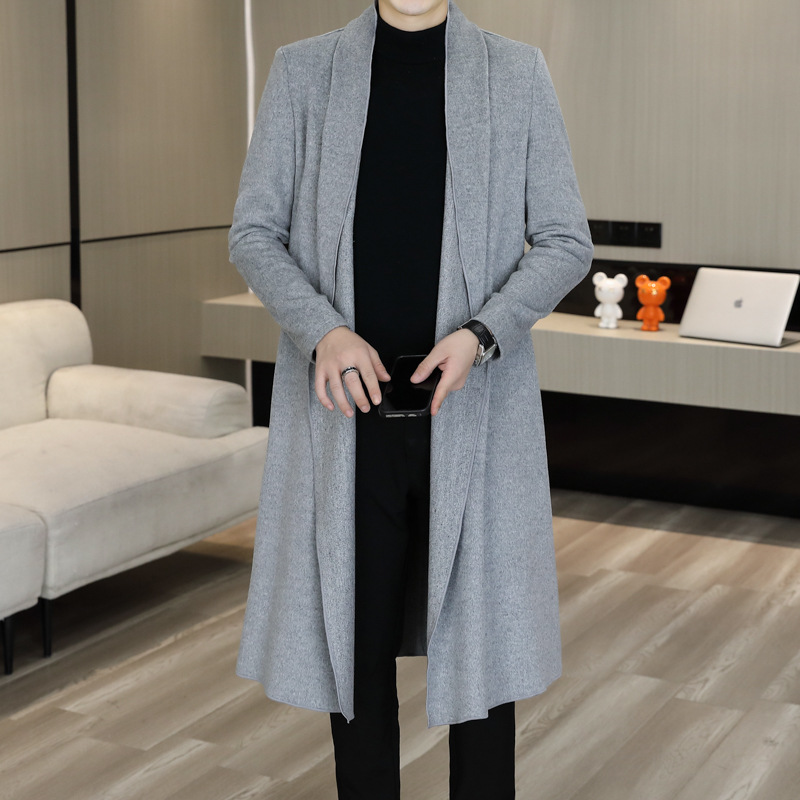 非主流のトレンチコートの男性の新型男性の長い版は膝のカーディガンのコートの中で青年のファッションの長い弾力のコートを過ぎます。