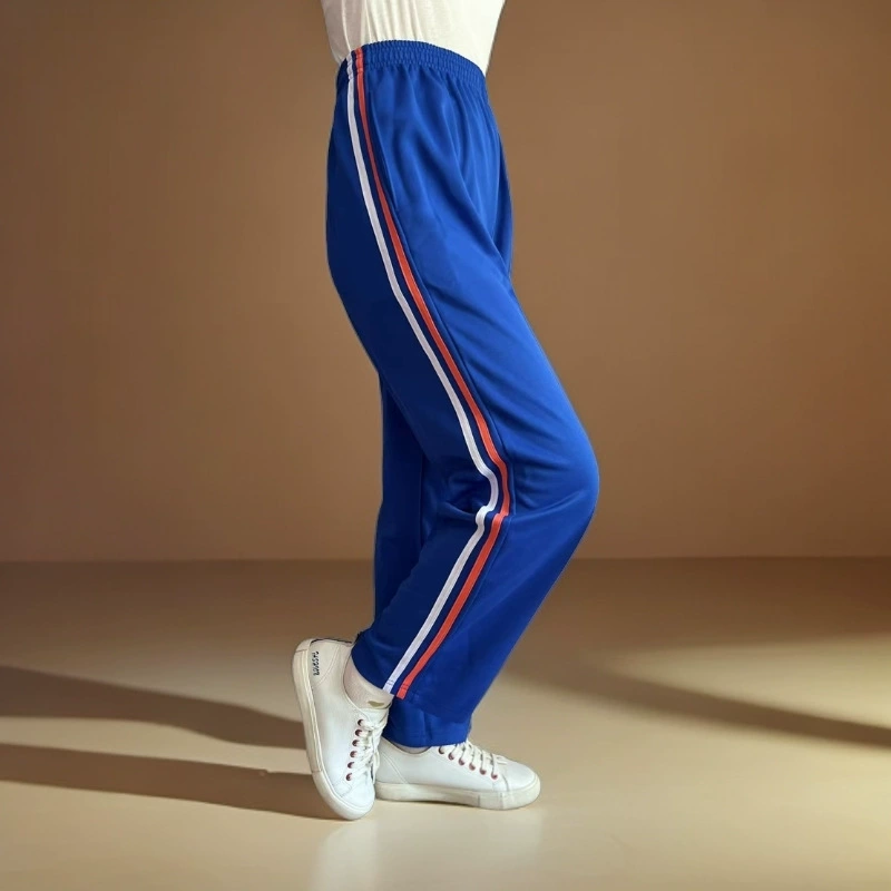 Прямые брюки королевского синего цвета для начальной школы с двумя оранжевыми и белыми полосками, тонкие спортивные брюки для мальчиков и девочек.