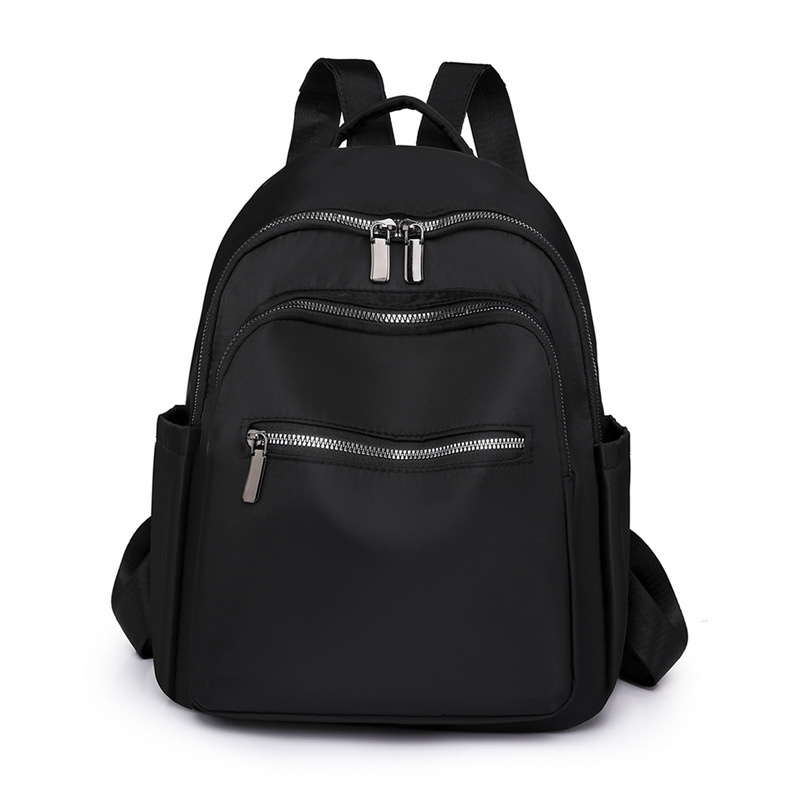 2023 nueva mochila de tela Oxford de color sólido para mujer, arte urbano, viajero, mochila de viaje ligera, mochila escolar al por mayor